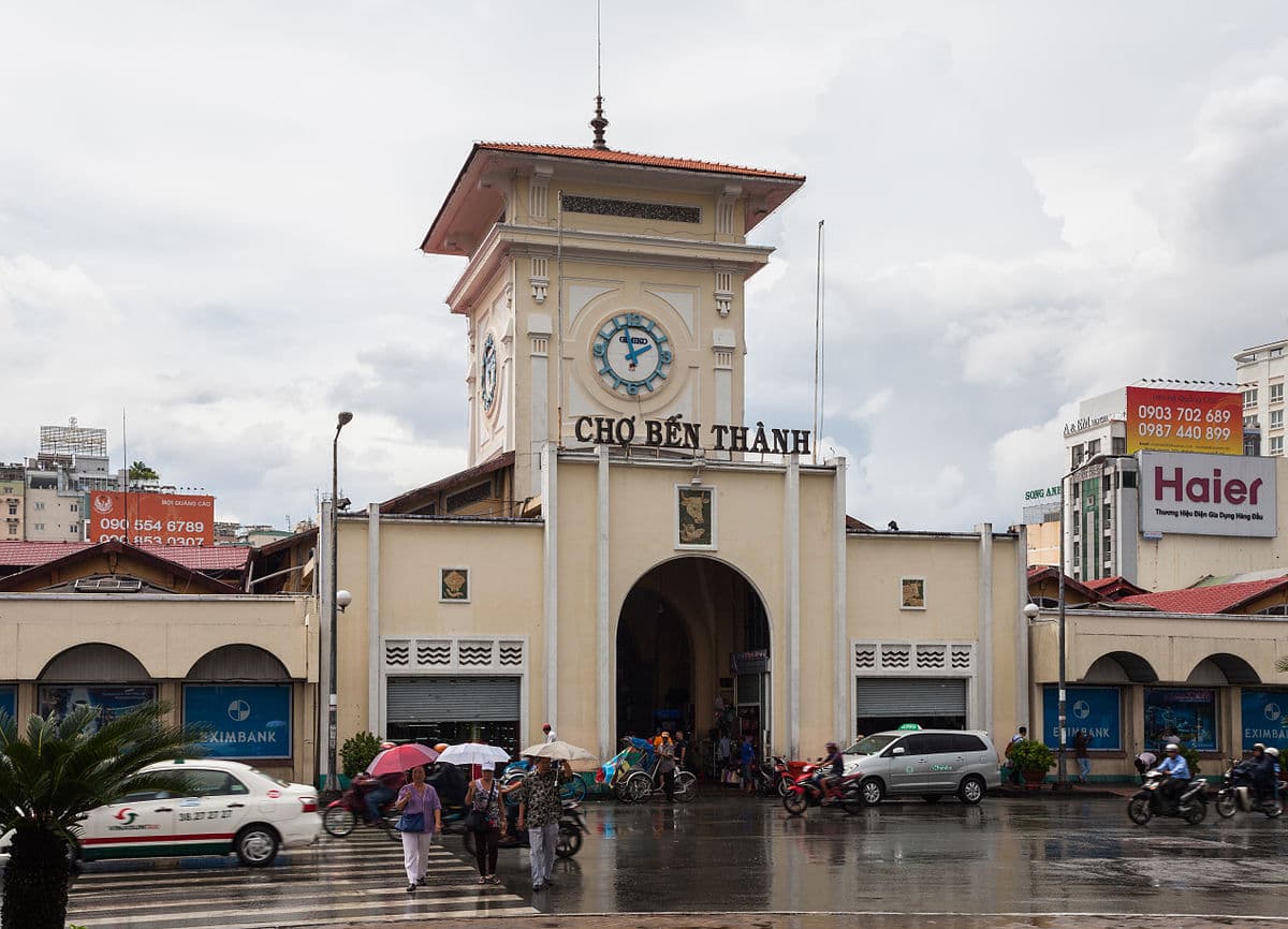 Ben Thanh Market in central HCMC at peak hour — the foot-traffic baseline for any Vietnamese cost comparison, anchoring the country's mid-cheap position in Southeast Asia