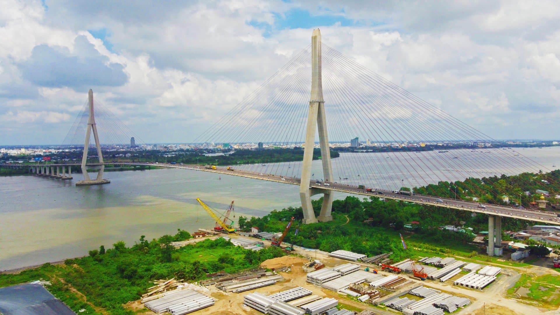 Aerial view of the cable-stayed Can Tho Bridge spanning the wide brown Hau River, the last crossing on the expressway from Ho Chi Minh City into Can Tho