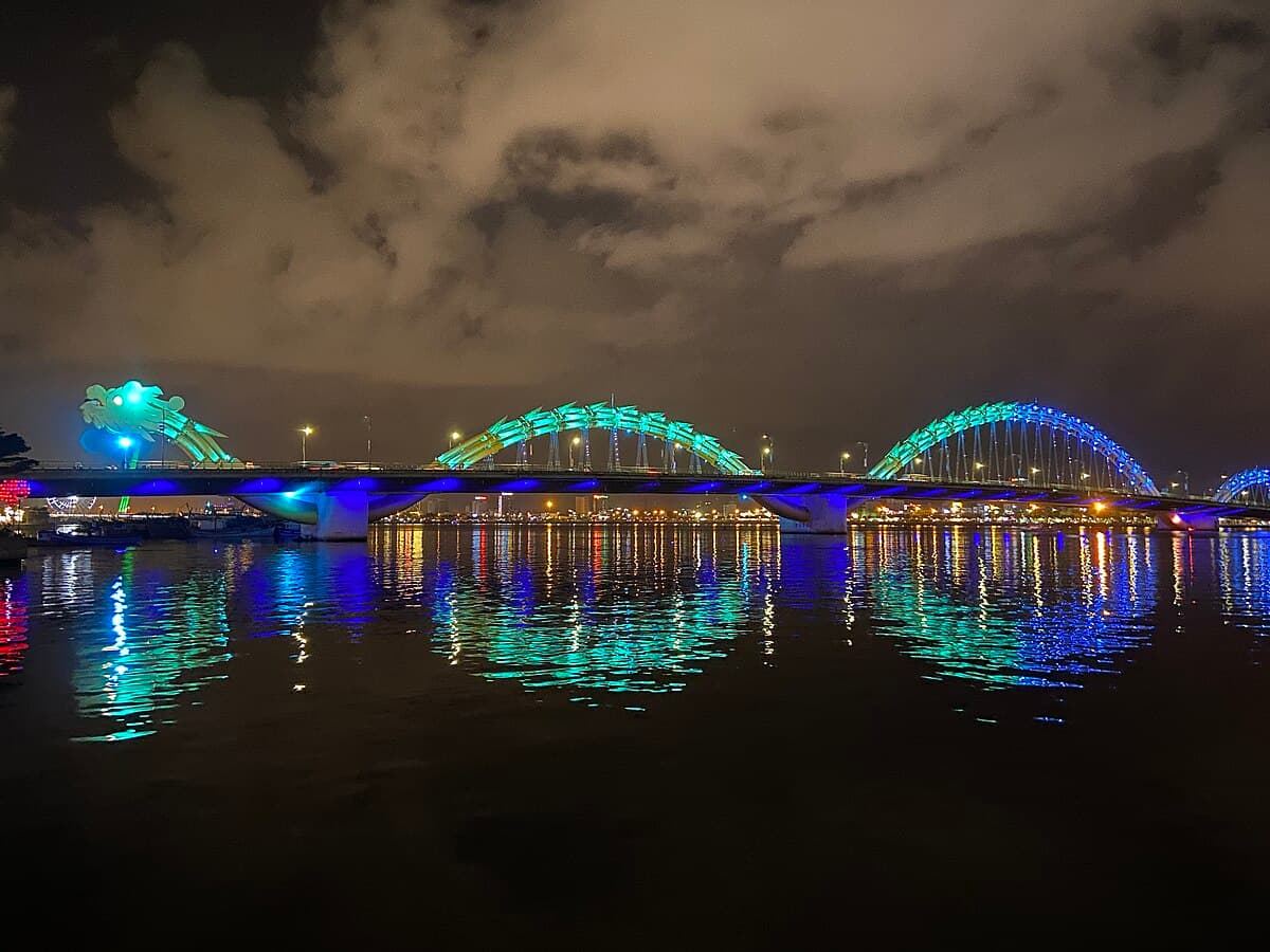 Dragon Bridge lit up at night in Da Nang