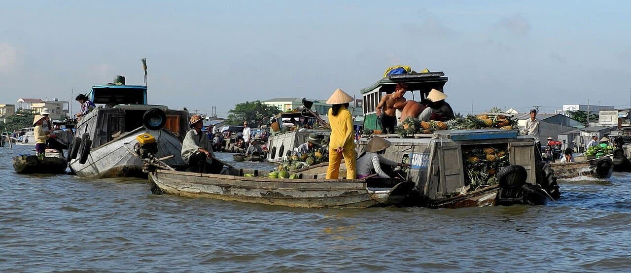 Can Tho floating market on the Mekong Delta — the canonical day-trip subject from HCMC